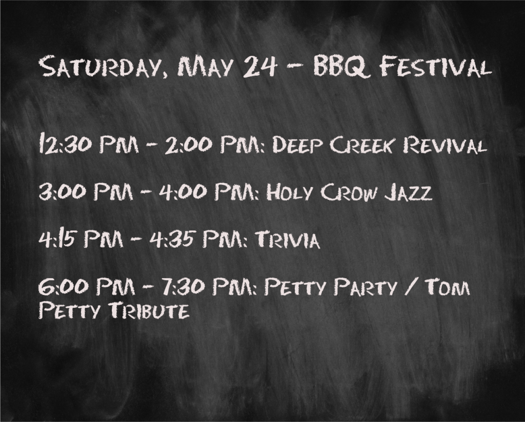 Chalkboard with the band schedule for May 24